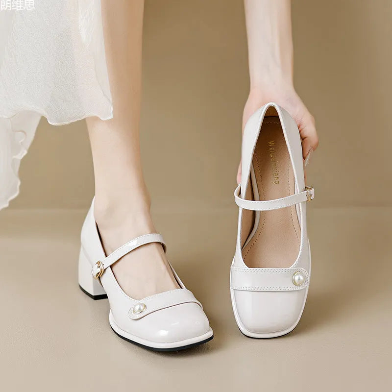 French style chunky heel hiking pump in patent leather with square toe and buckle closure