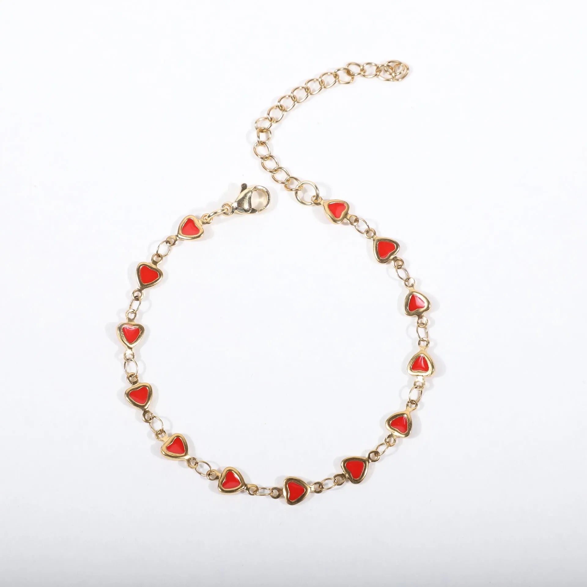 Stainless steel bracelet with heart design and gold plating in multiple colour options