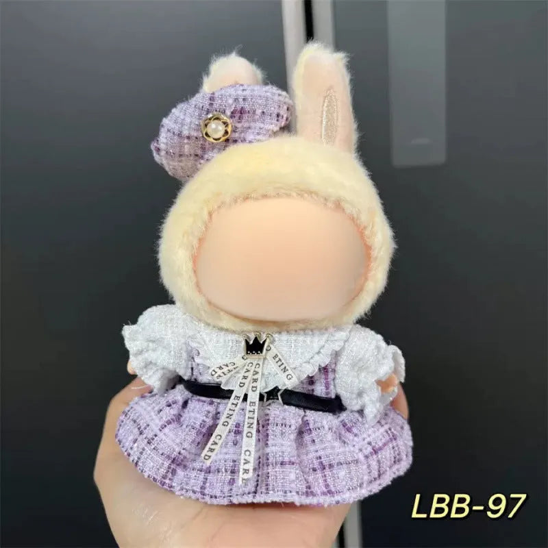 A plastic doll costume outfit for a 17cm tall vinyl figurine on a white background.