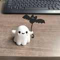 Mini resin statue of a ghost walking a dog, American Halloween style decoration