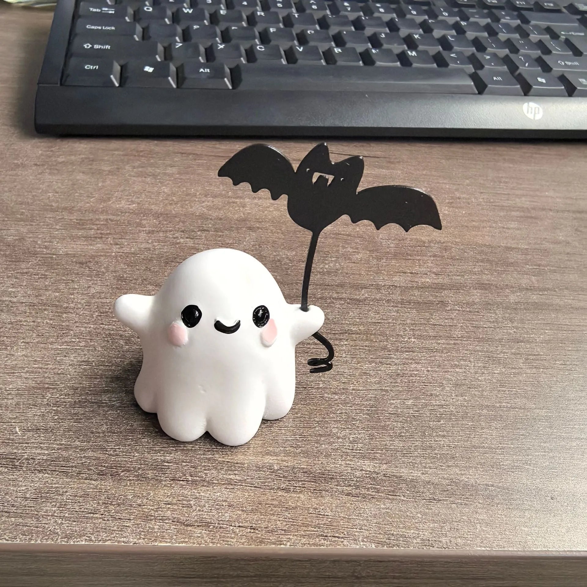 Mini resin statue of a ghost walking a dog, American Halloween style decoration