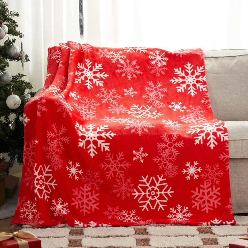 Soft plush Christmas blanket in polyester fibre showing colour options and size dimensions.
