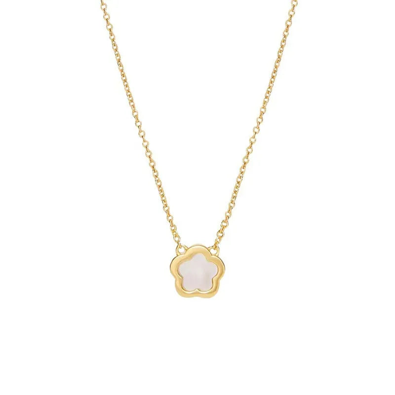 White mother-of-pearl shell flower necklace on a chain in silver or gold tone.
