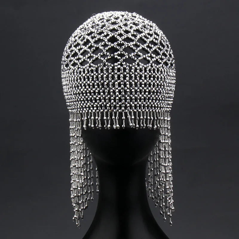 Belly dance hat with alloy frame, beaded ornamentation and tassels in silver or black
