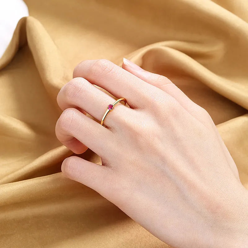 Women's copper ring with single diamond geometric design in round circle shape showing colour options
