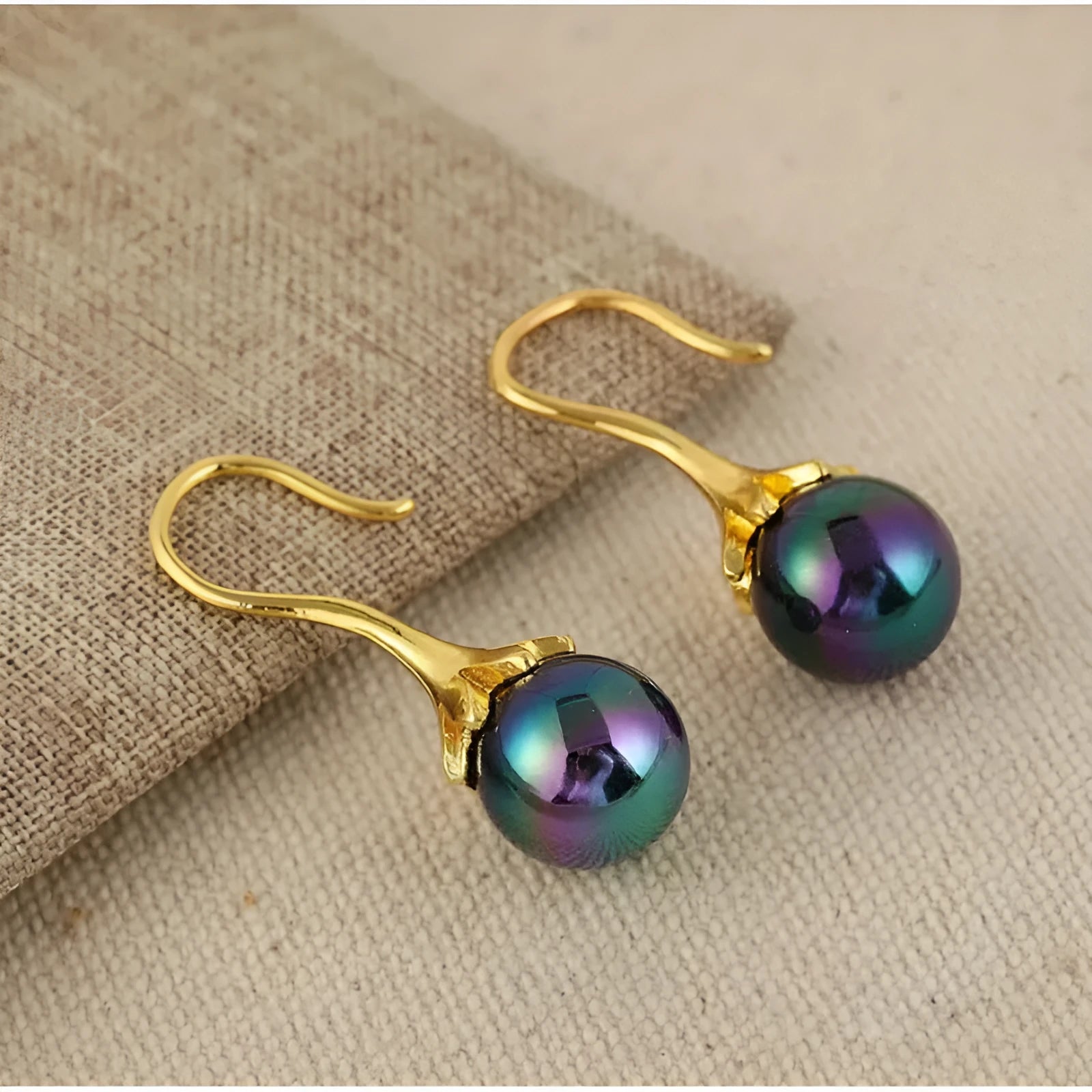Gold electroplated alloy earrings with retro fashion design for women