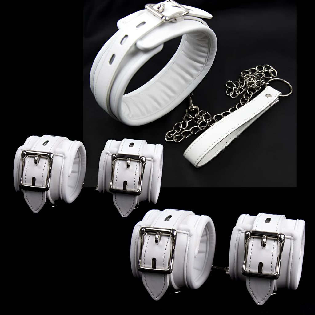 White PU sponge bondage set showing handcuffs, foot cuffs, and neck cuff for adult restraint