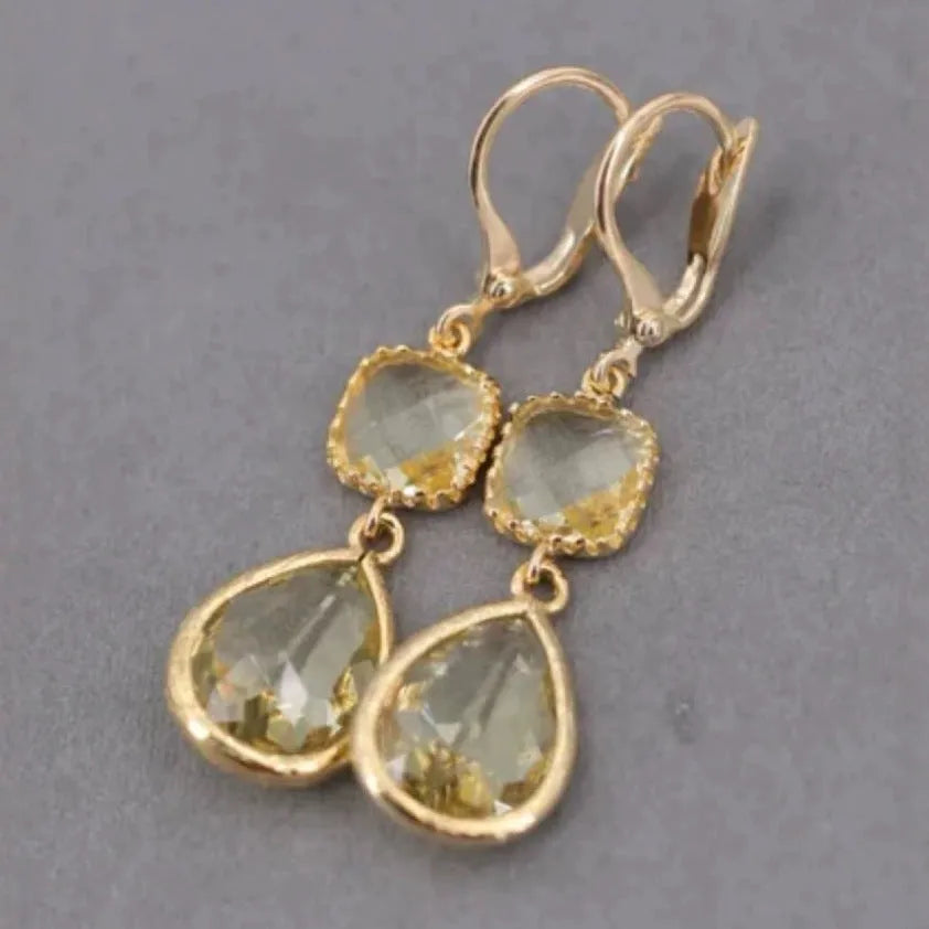 Gold geometric fringe earrings with water droplet design and retro styling
