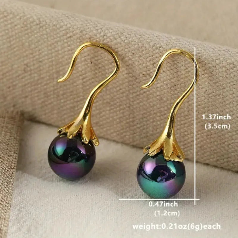 Gold electroplated alloy earrings with retro fashion design for women