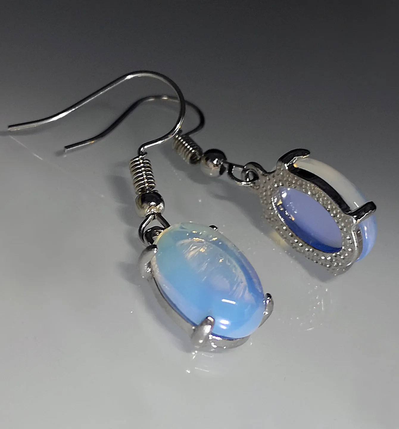 Opal cross pendant drop earrings with moonstone crystal accents measuring 20-24cm in retro vintage style