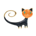 Close-up of a white painted cat tail brooch made from alloy metal.