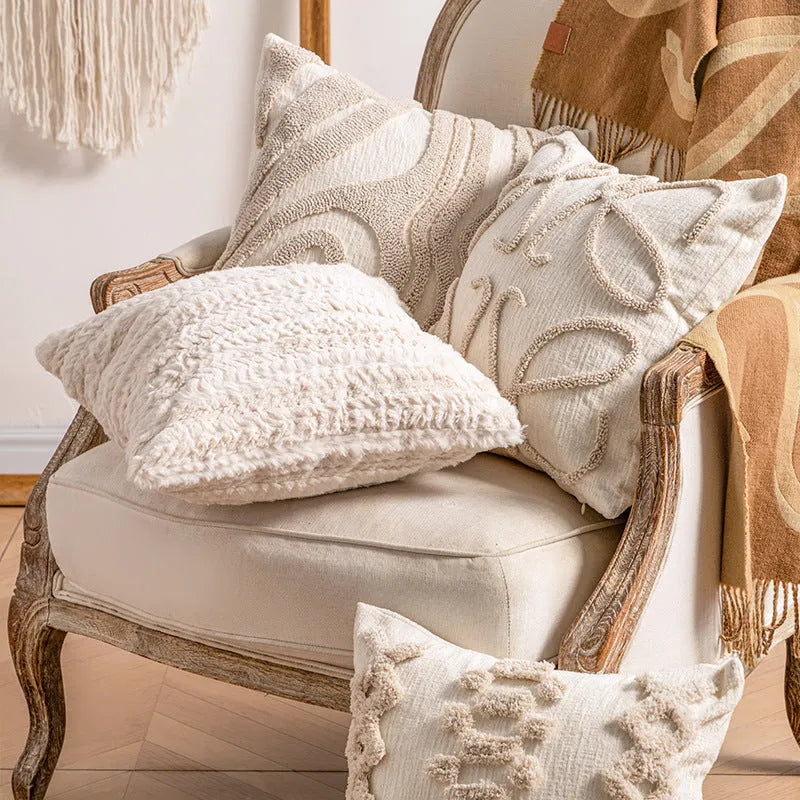 Decorative knitted sofa cushion cover with tassel trim in a choice of six patterns and two sizes.