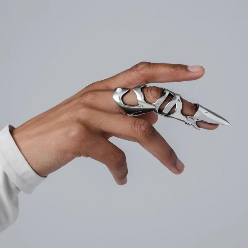 Silver alloy punk armour finger ring with stall design on model hand