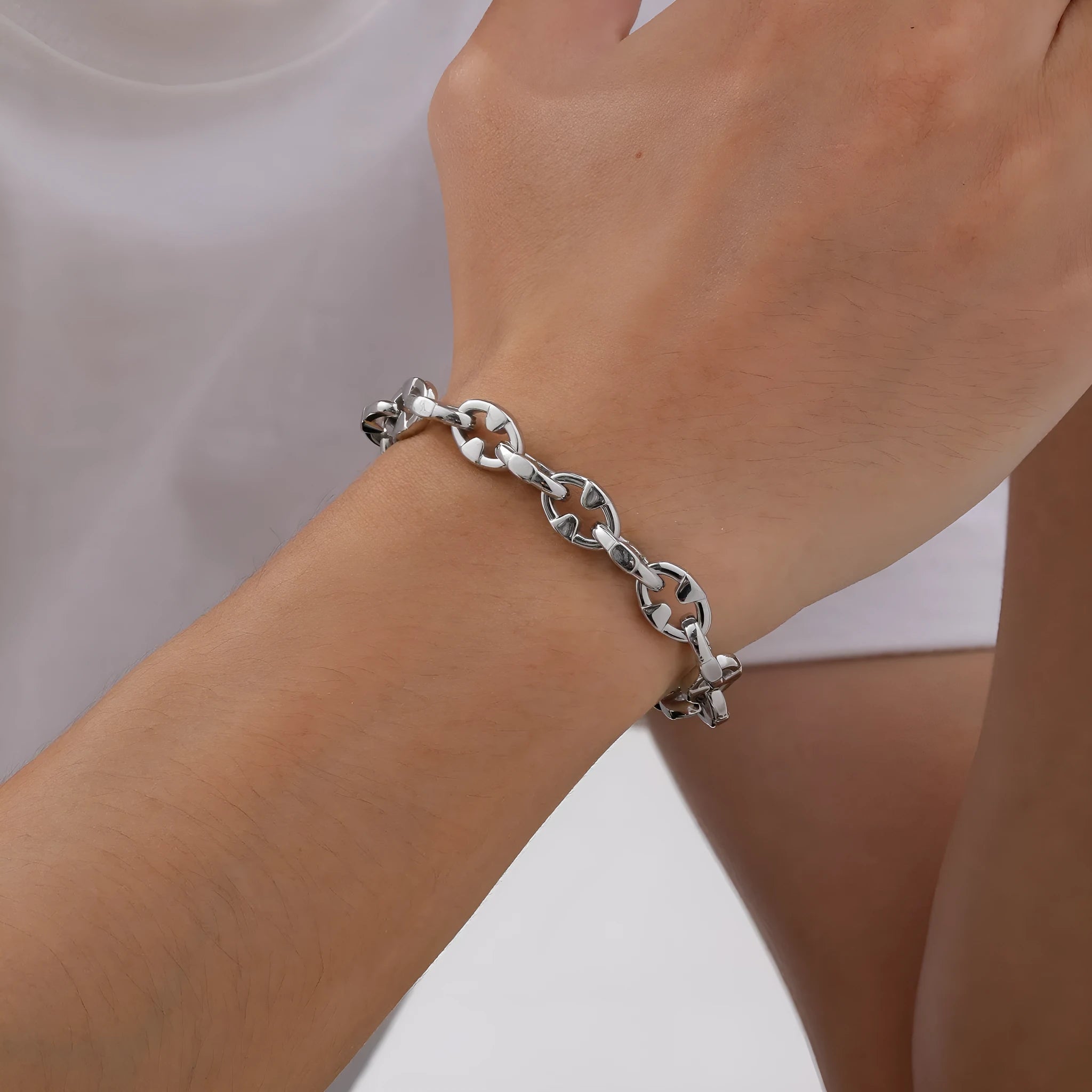 Thick handmade stainless steel chain bracelet with geometric links, steel colour.