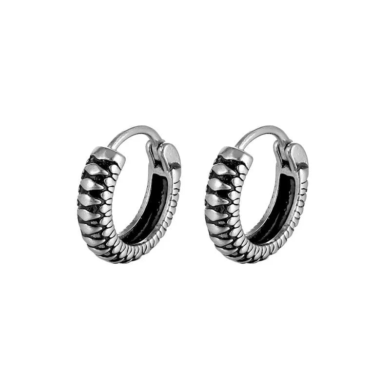 Silver geometric stud earrings with a retro striped twist pattern, made from titanium steel.