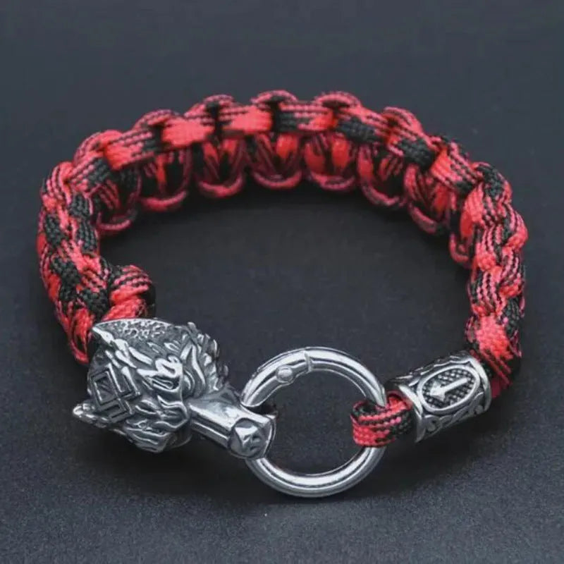 Handmade titanium steel wolf head bracelet in camouflage colour showing polished finish and detailed animal design.