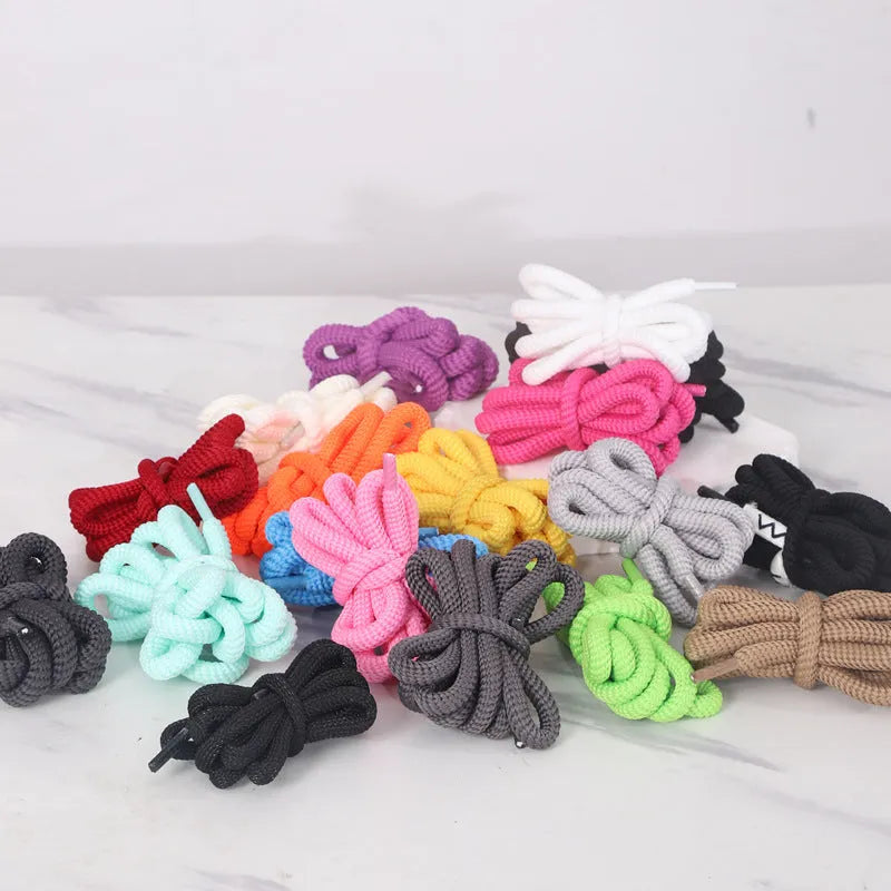 A selection of round braided shoelaces and hoodie cords in various colours, showing 1.0cm width