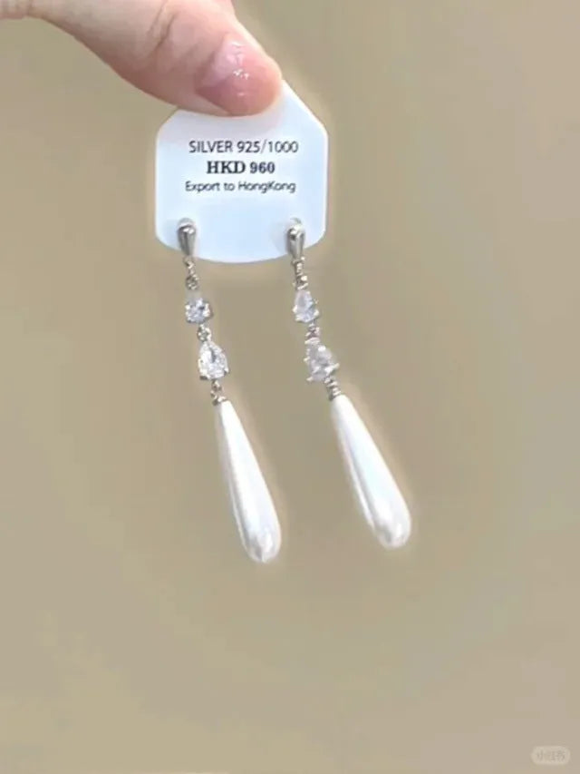 Women's geometric alloy ear clips with rhinestone decoration, star motifs, heart elements, and tassel details