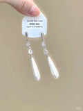 Women's geometric alloy ear clips with rhinestone decoration, star motifs, heart elements, and tassel details