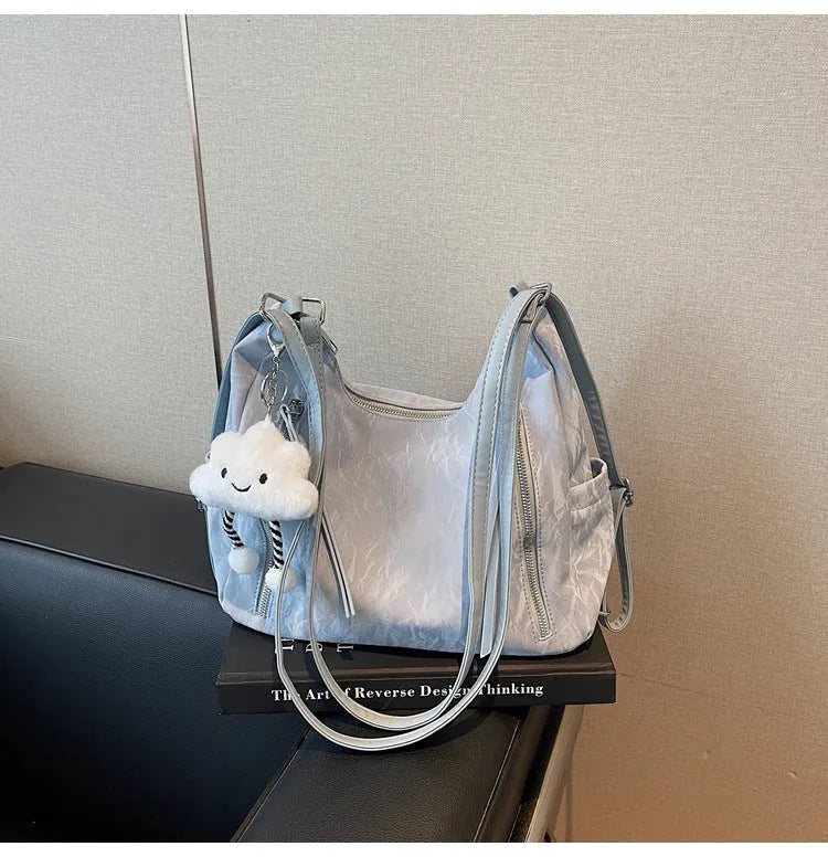 Women's soft PU fashion backpack in black, milky white, silver or blue colours
