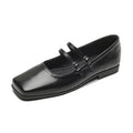 Women's silver genuine leather Mary Jane flats with a cross buckle strap and round toe.