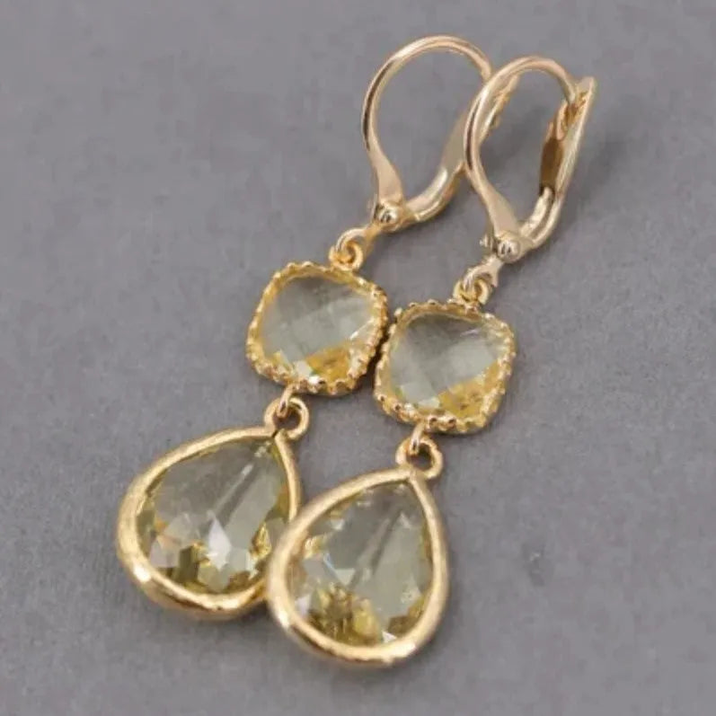 Gold geometric fringe earrings with water droplet design and retro styling