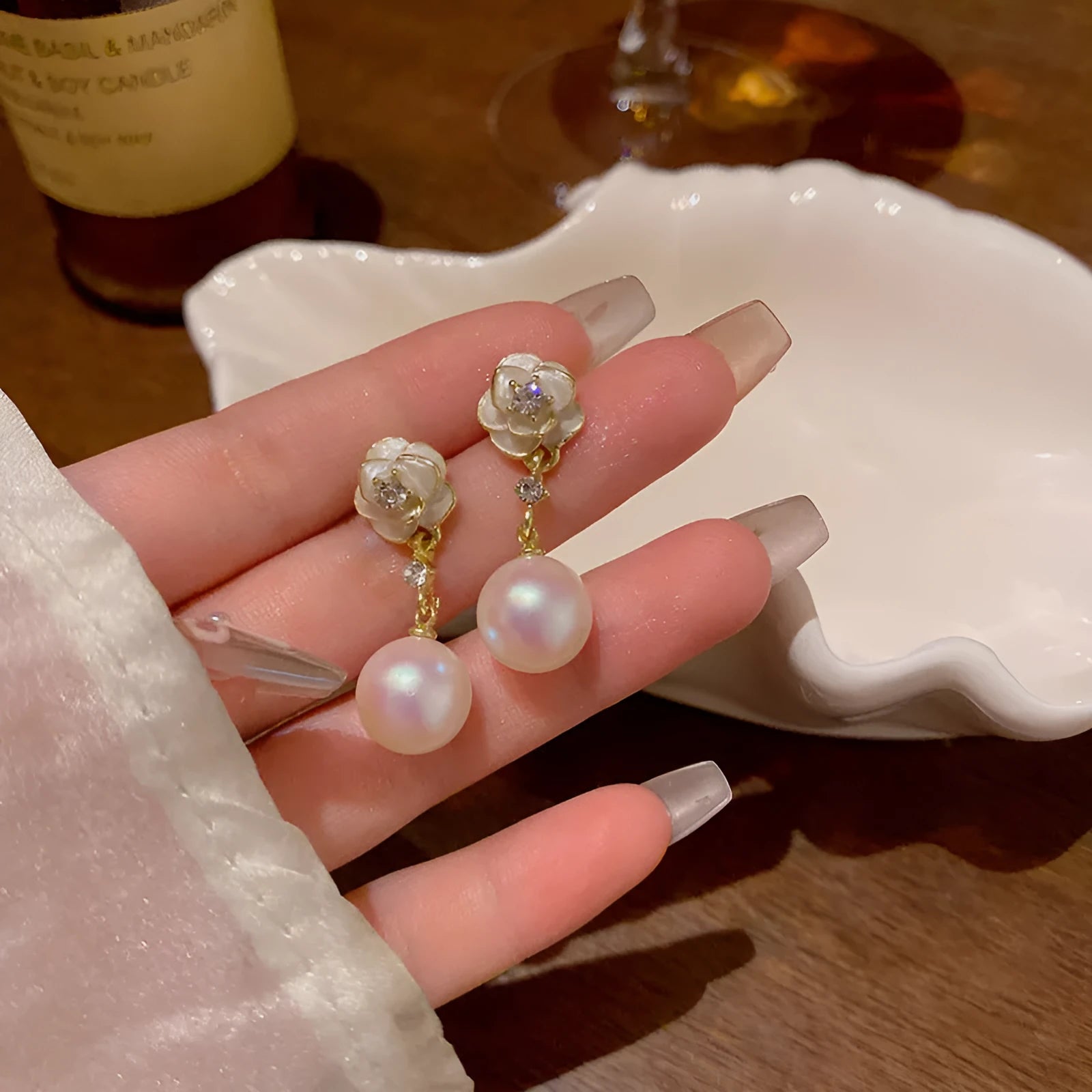 Camellia pearl flower stud earrings for women in alloy metal with floral design