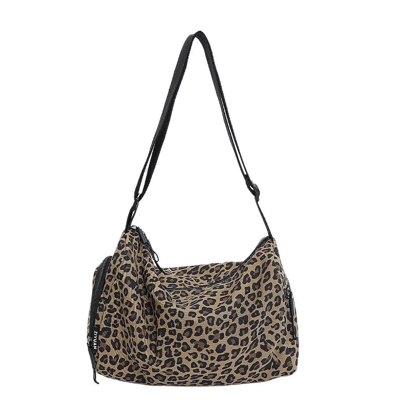 Large capacity leopard print cross-body messenger bag with shoulder strap
