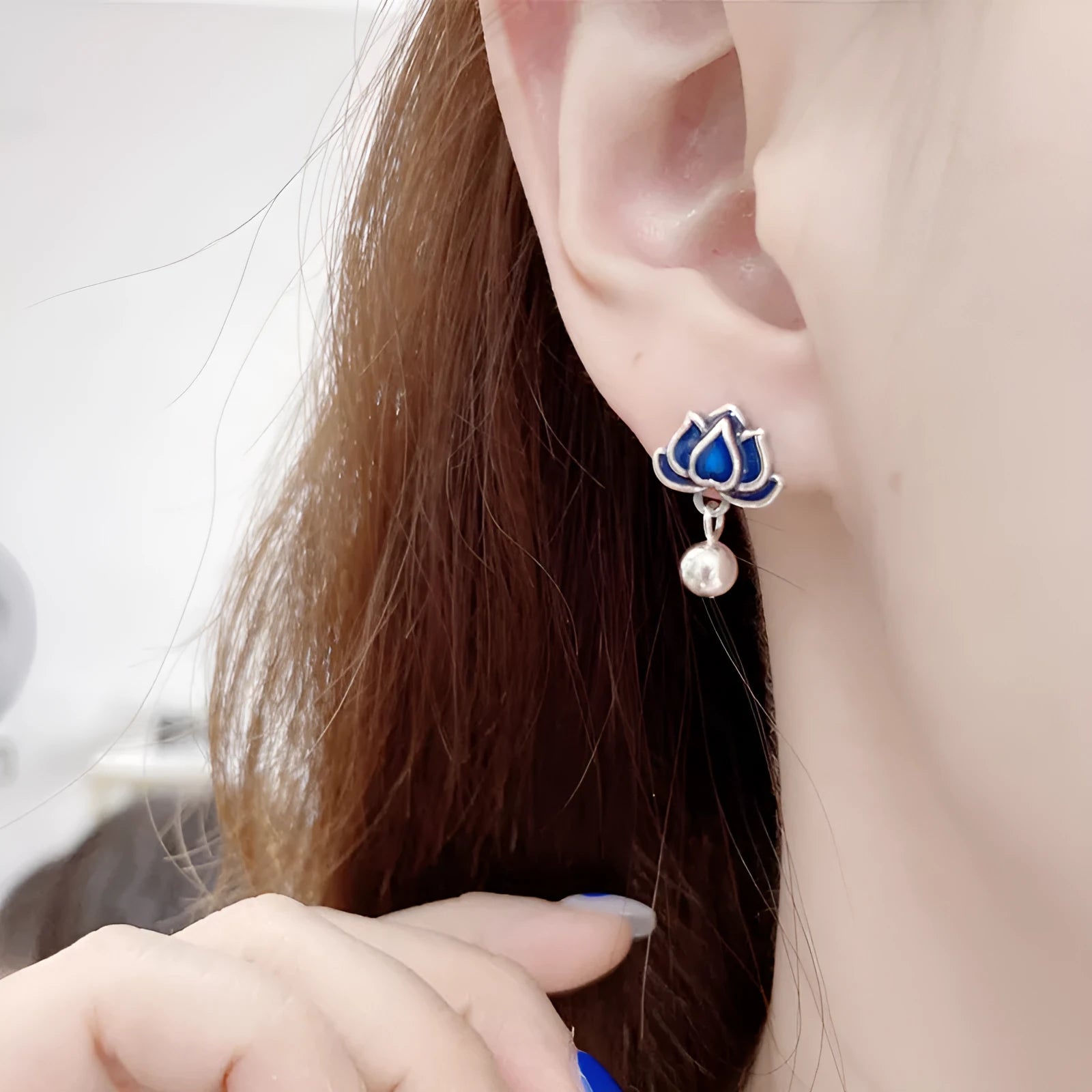 Blue lotus flower ear studs with seedpod tassels measuring 1.2cm wide