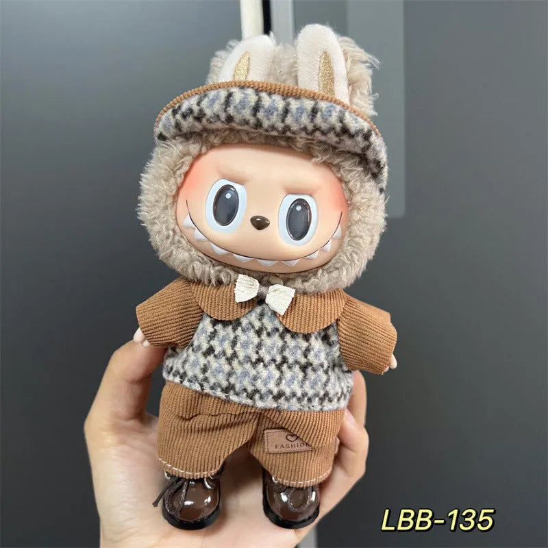 A plastic doll costume outfit for a 17cm tall vinyl figurine on a white background.