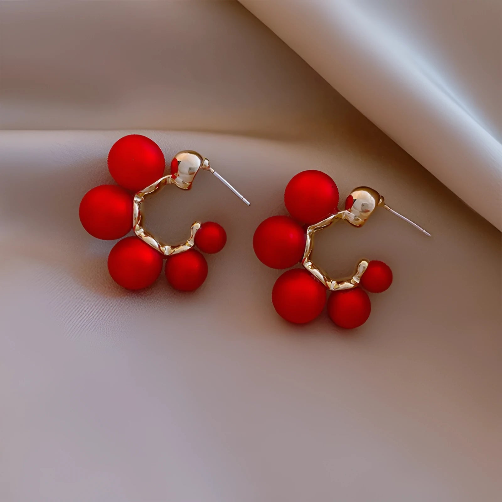 Red alloy bell earrings with decorative charm for women