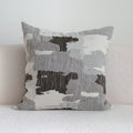 Coffee brown striped Chinese classical style decorative sofa cushion on a grey sofa.