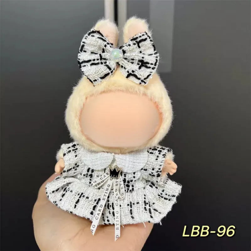 A plastic doll costume outfit for a 17cm tall vinyl figurine on a white background.