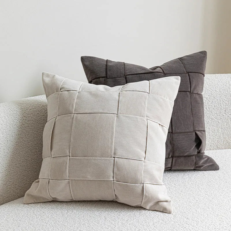 Chenille woven square cushion in beige colour on a sofa, showing its 50x50cm size and textured fabric.