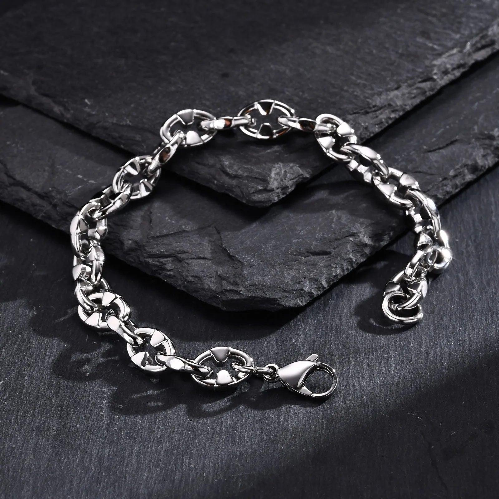Thick handmade stainless steel chain bracelet with geometric links, steel colour.