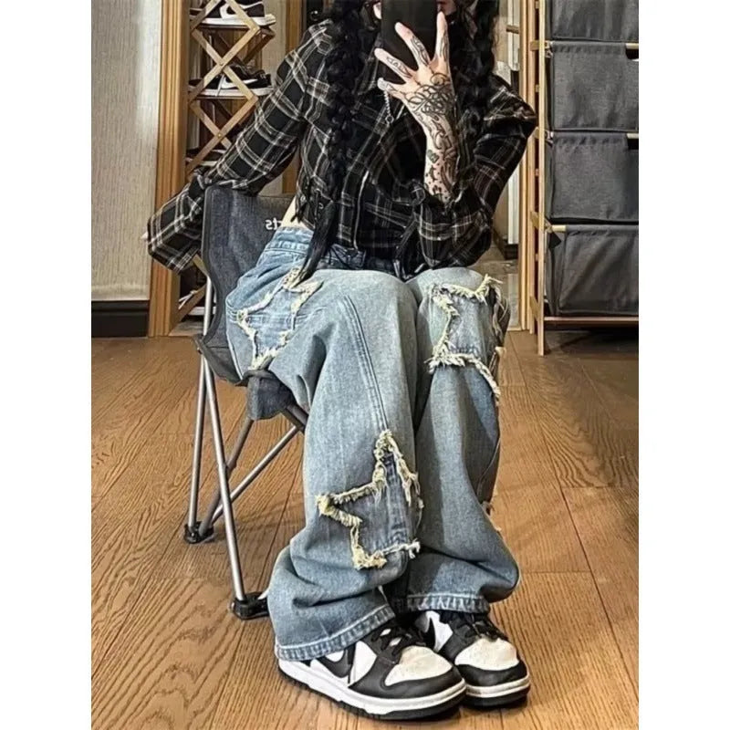 Blue straight-leg women's jeans with high waist design on hanger