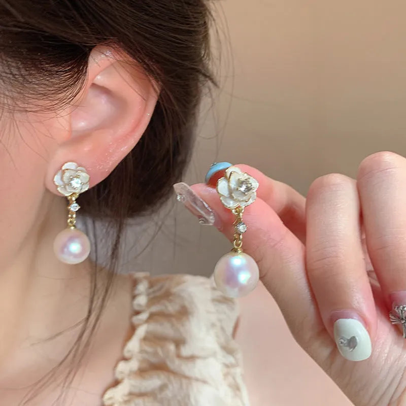 Camellia pearl flower stud earrings for women in alloy metal with floral design