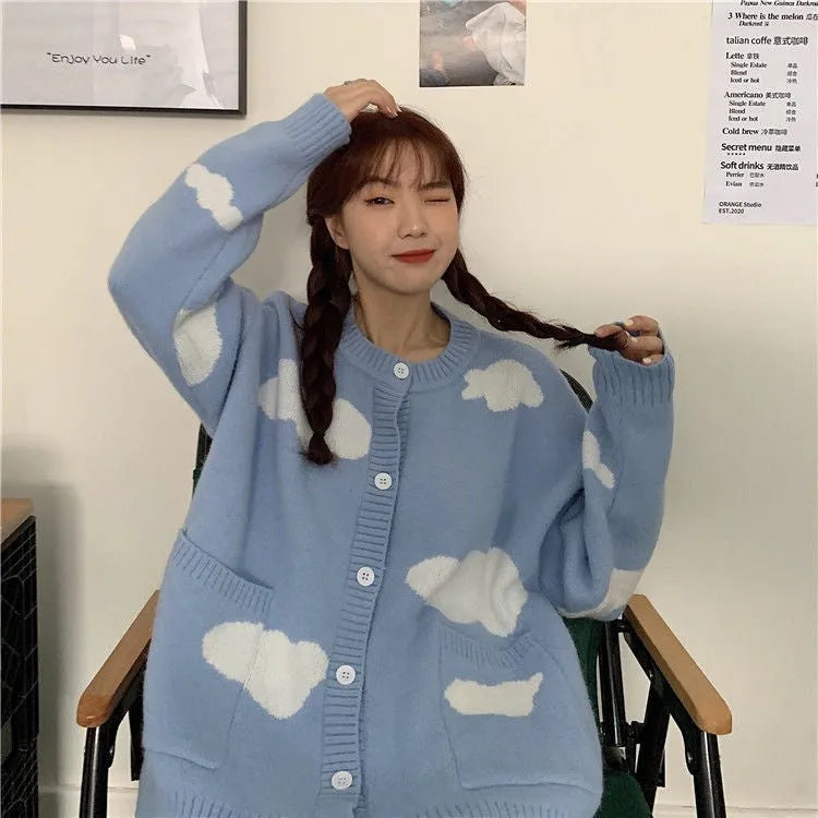Blue cloud pattern women's loose cardigan sweater with long sleeves on hanger