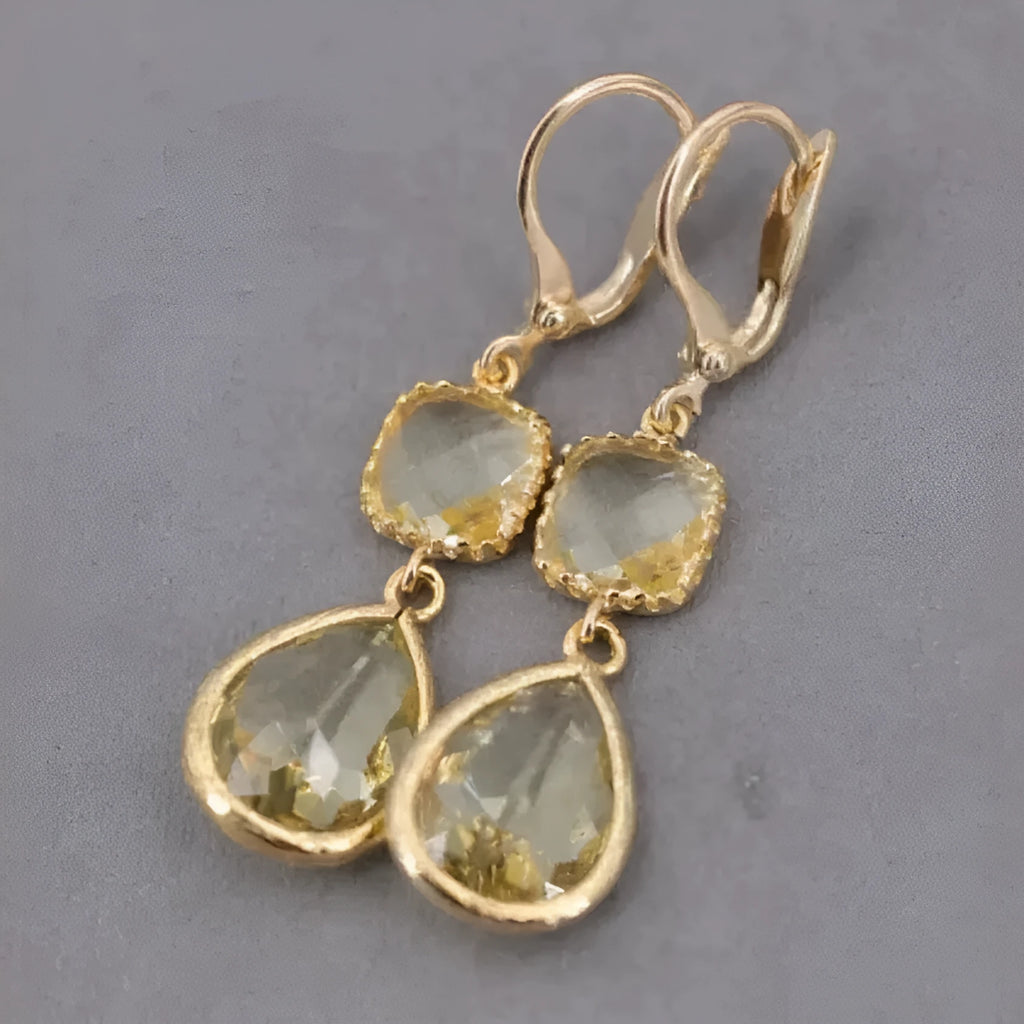Gold geometric fringe earrings with water droplet design and retro styling