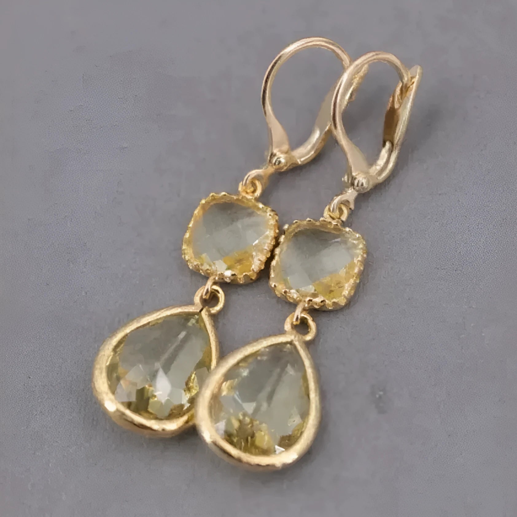 Gold geometric fringe earrings with water droplet design and retro styling
