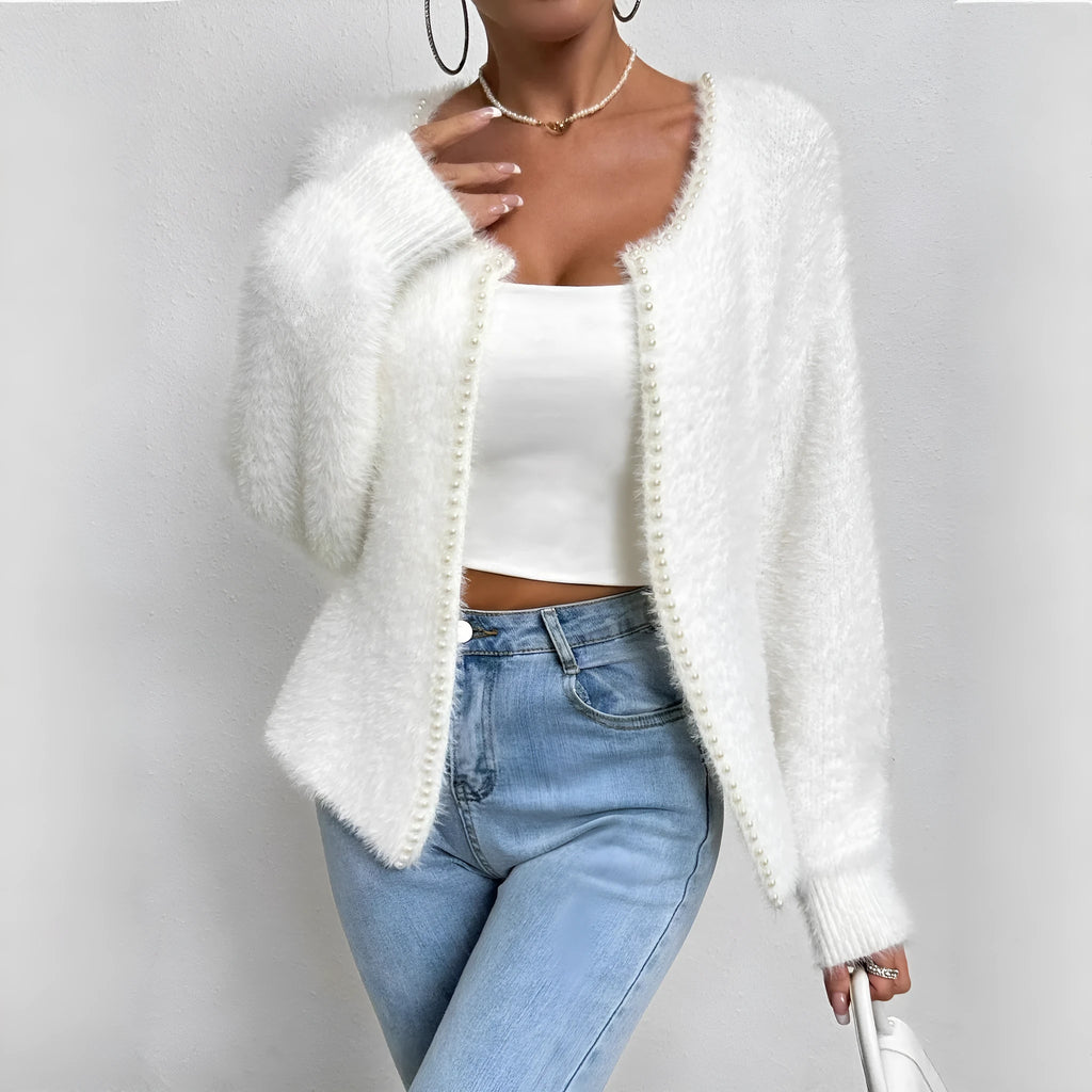 White women's V-neck cardigan with medium thickness polyester knit construction
