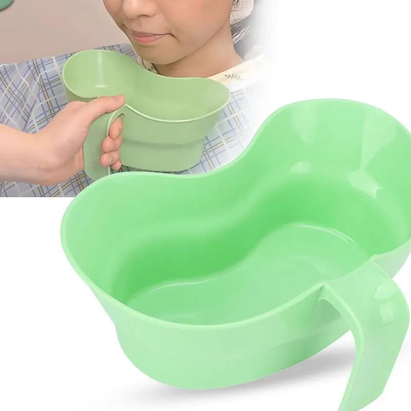 Green plastic nursing gargle cup with specialised spout for bedridden patient oral care
