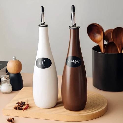 Ceramic oil pot with funnel and brush for kitchen oil storage in 650ml capacity