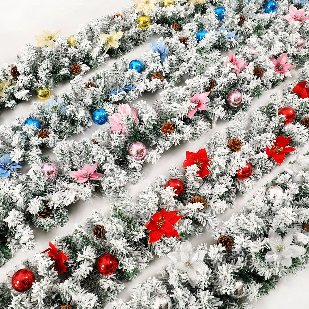 PVC Christmas rattan garland with flocking in golden colour, draped decoratively.