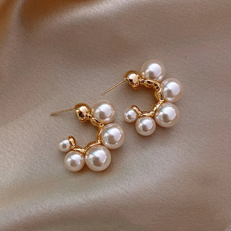 Red alloy bell earrings with decorative charm for women