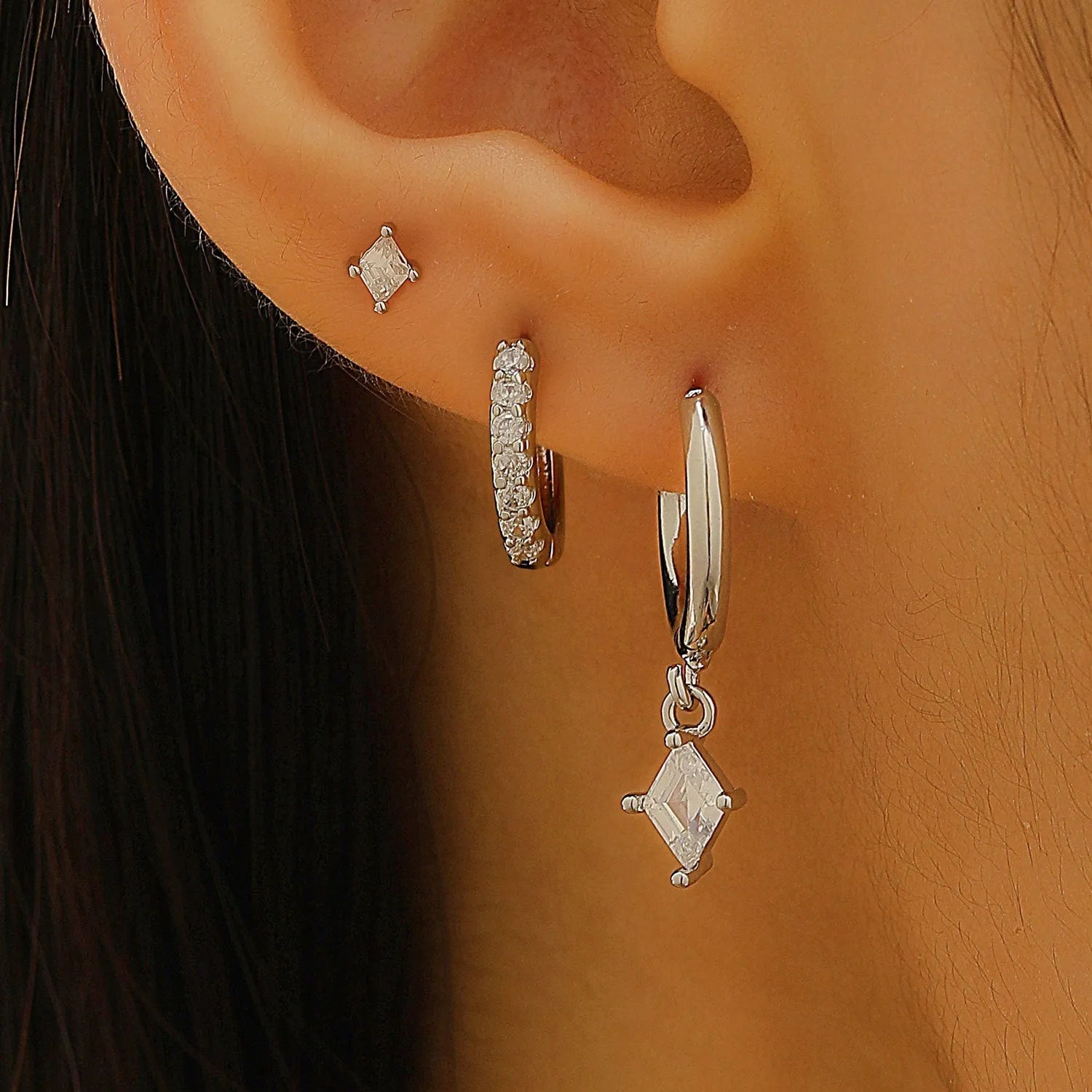 Three-piece ladies earring set with geometric zircon designs in gold and white copper jewellery