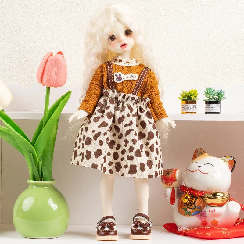 French doll dress-up clothes in 11 colour themes including rococo, caramel pudding, and bear infested designs