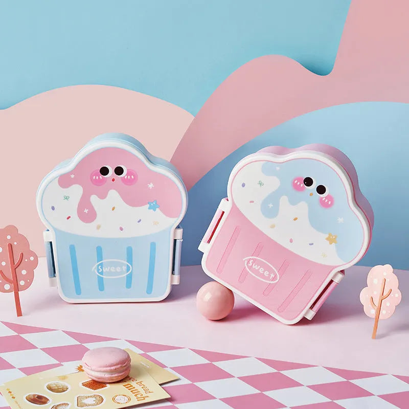 Pink and blue cartoon-style ice cream shaped plastic lunch boxes with spoons and forks.