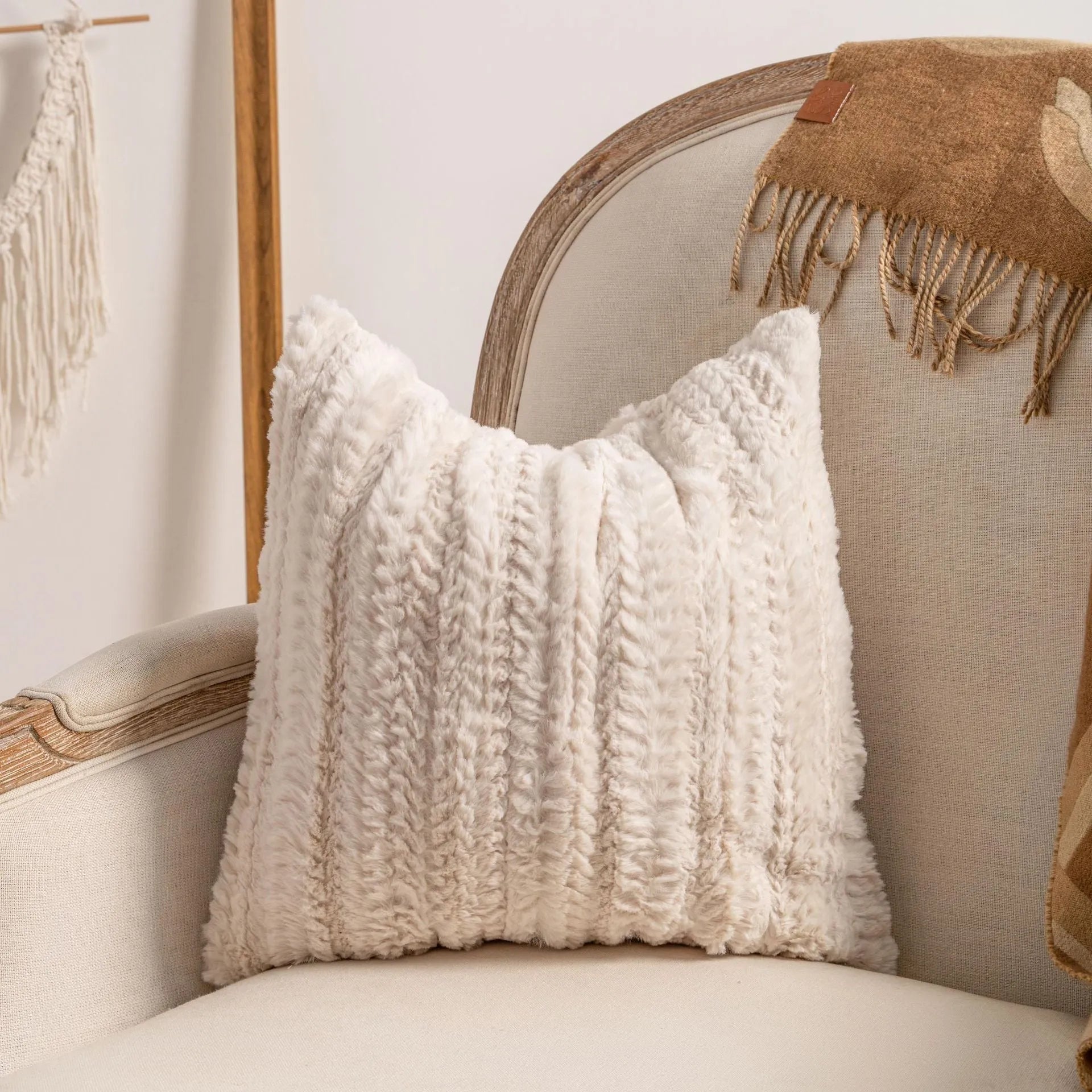 Decorative knitted sofa cushion cover with tassel trim in a choice of six patterns and two sizes.