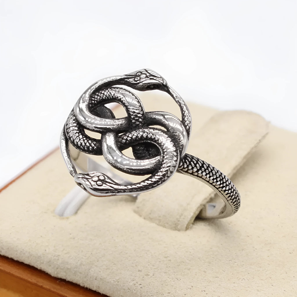 Steel-coloured titanium steel ring with an entwined double snake retro design.